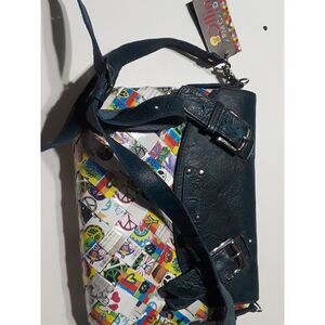 Rollin Arm Candy Crossbody Bag Upcycled Peace Sign Print Buckle Accent